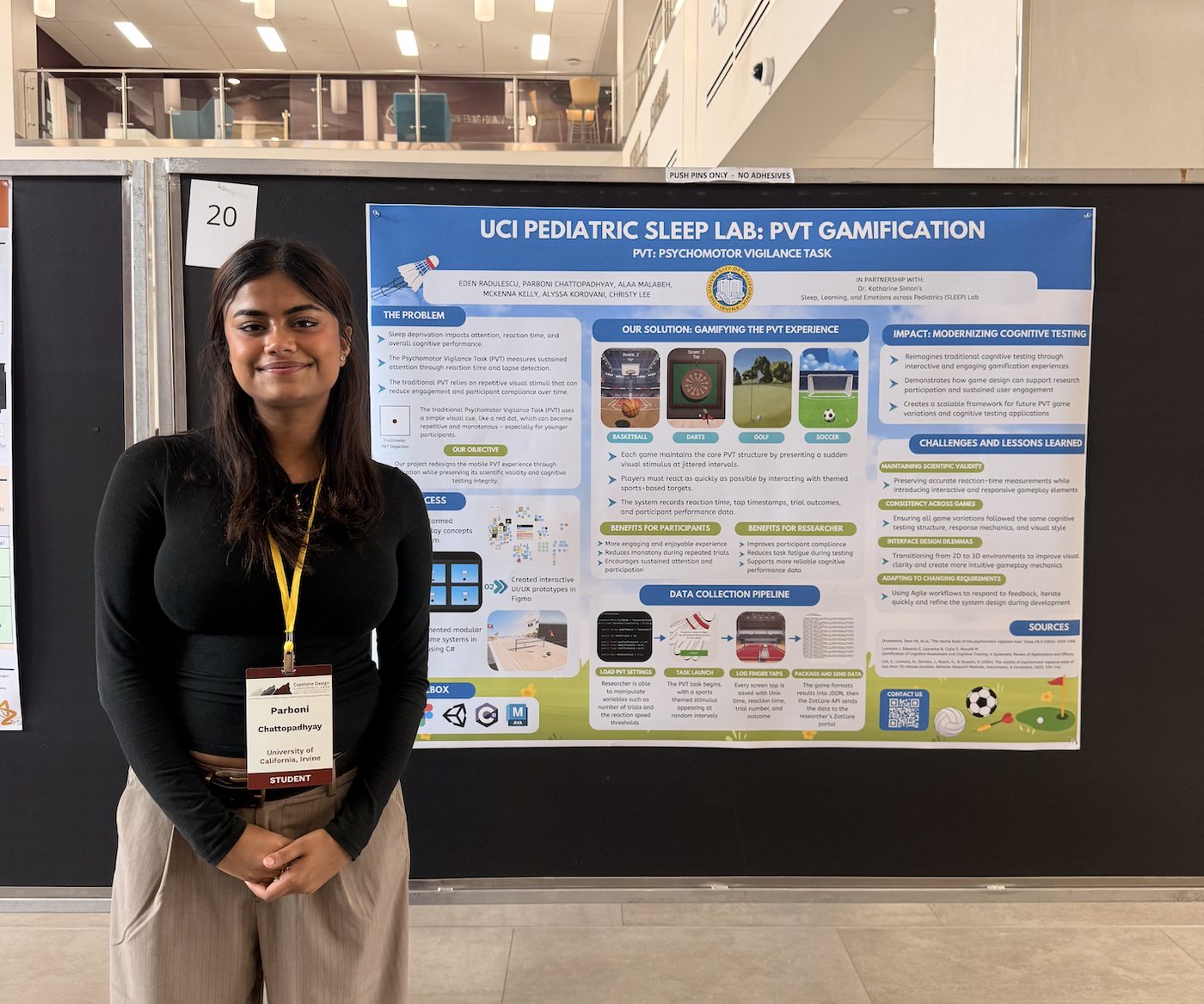 Parboni beside the PVT Gamification poster at the Capstone Design Conference